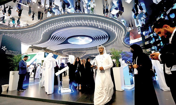 People showed exceptional interest in various technological products at Gitex Global in Dubai on Tuesday. Kamal Kassim / Gulf Today