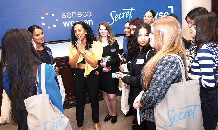 Financial educator and author Berna Anat shares financial wellness advice with young women at the Seneca Women and Secret Deodorant’s Young Women’s Financial Wellness Forum  at the New York Stock Exchange on Wednesday.   Associated Press