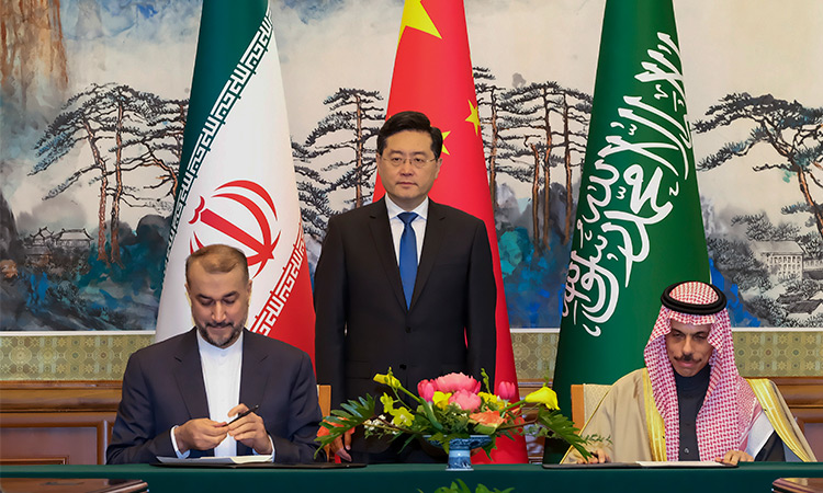 Chinese Foreign Minister Qin Gang (centre), witness his Iran’s counterpart Hossein Amirabdollahian (left) and Saudi Arabian counterpart Prince Faisal bin Farhan Al Saud, right, signing of a joint statement between Saudi Arabia and Iran, in Beijing.  File/Associated Press