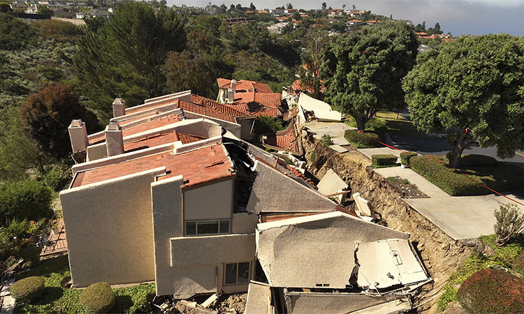 This photo shot with a drone shows damage from earth movement to a property in Rolling Hills Estates, Califofrnia. AP