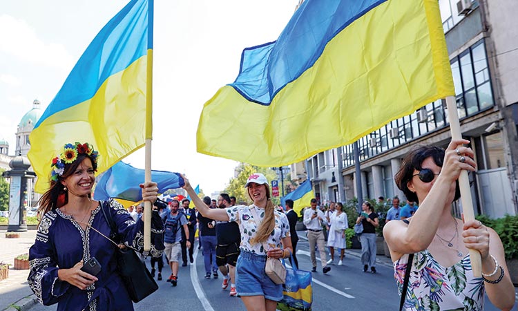 People take part in a march of solidarity to mark Ukraine’s Independence Day in Belgrade, Serbia, on Aug.24, 2023.    Reuters