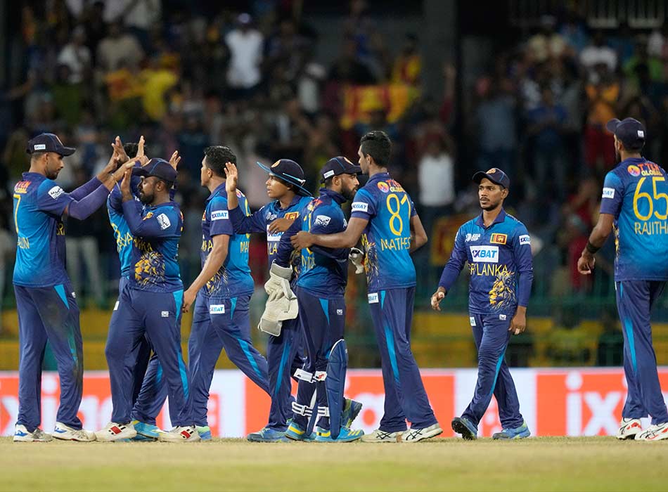  Sri Lankan players celebrate their win over Bangladesh by 21 runs in the Asia Cup match in Colombo, Sri Lanka, on Saturday. AP