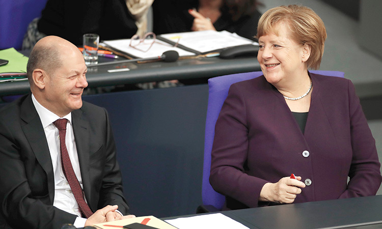 Olaf-Scholz-and-Angela-Merkel