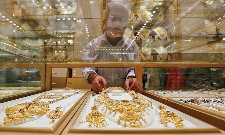 Gold prices up at new record levels