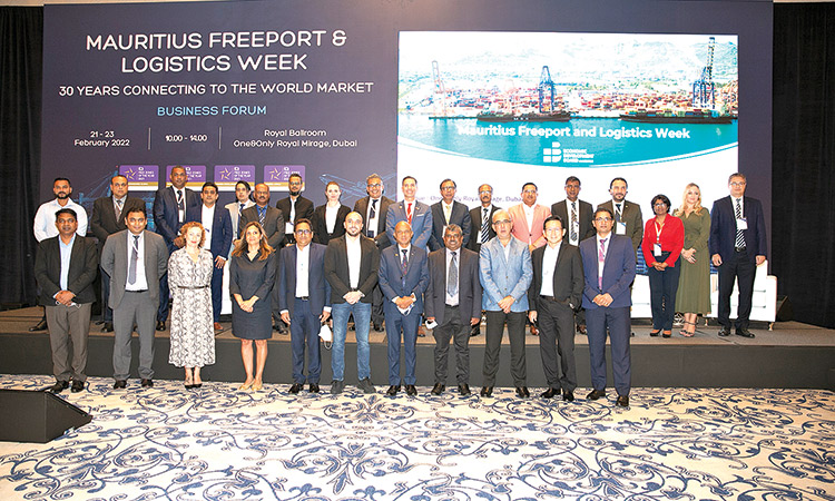 Participants pose for a group photo during the event in Dubai.