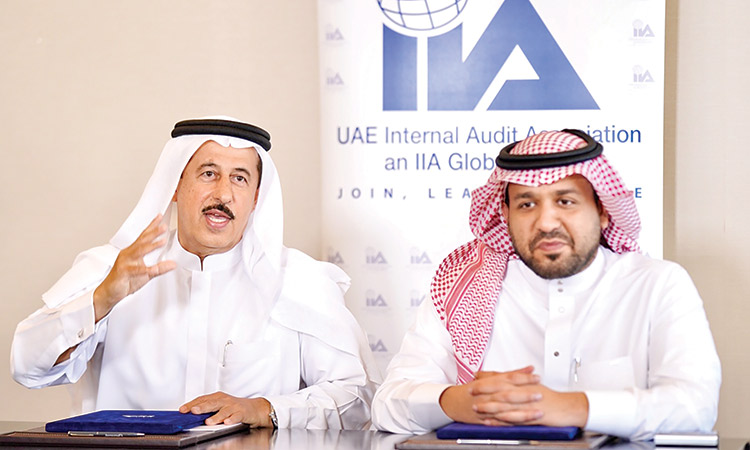 Officials of UAE Internal Auditors Association and Saudi Internal Auditors Association after signing the agreement.