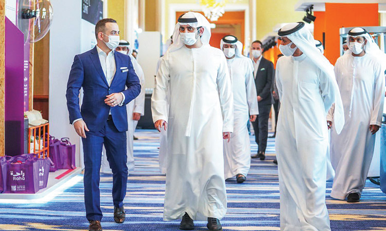 Sheikh Maktoum is being briefed during his tour of various stands at the event on Monday.