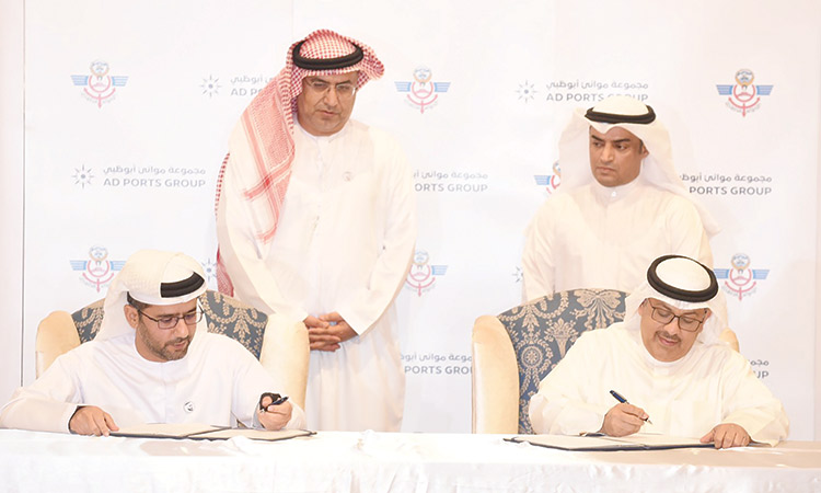 Top officials during the MoU signing ceremony in Kuwait.