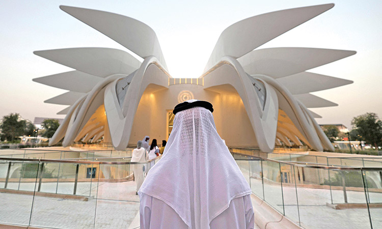 A visitor stands outside the Emirates Pavilion. Expo 2020 Dubai, which closed on Thrusday, opens more avenues for local and global investors to tap the market.