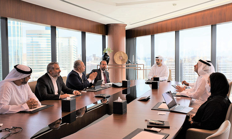 Omar Sultan Al Olama with Equiti Group officials.