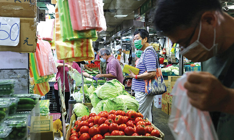 Taiwan’s government said the economic outlook was clouded by inflation.