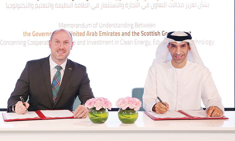 Dr Thani Al Zeyoudi and Neil Gray during the signing ceremony  in Abu Dhabi.