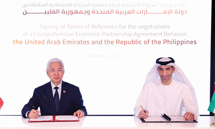 Dr Thani Bin Ahmed Al Zeyoudi and Alfredo E. Pascual during a signing ceremony in Abu Dhabi.