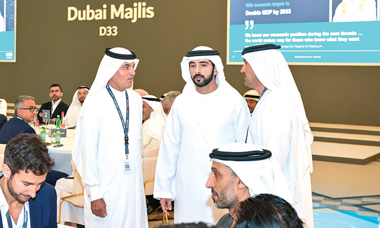 Sheikh Hamdan interacts with officials during his visit to Dubai Majlis   on Wednesday. 