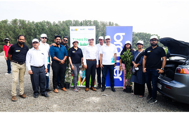 Almoe, Brother MEA and GEMS team at the tree planting drive at Tadweer