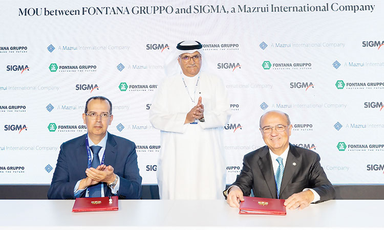 Officials of Fontana Gruppo and Sigma Enterprise signing the agreement.