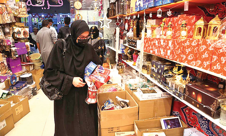 A woman shops in a local market in Riyadh.