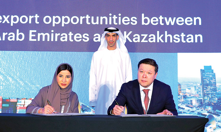 Top officials at the signing ceremony in Dubai.