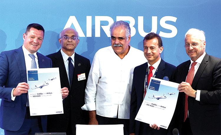 Top officials of IndiGo and Airbus during a news conference after a purchase agreement at the 54th International Paris Airshow in Paris on Monday.  Reuters