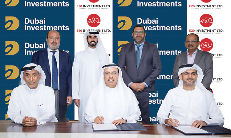 Officials of Dubai Investments and E20 Investment after signing the MoU.