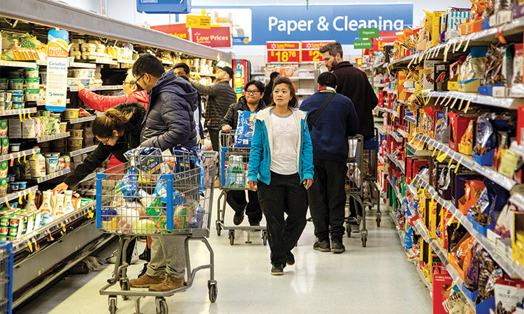 People shop at a Walmart Supercentre in Toronto, Ontario, Canada. Reuters