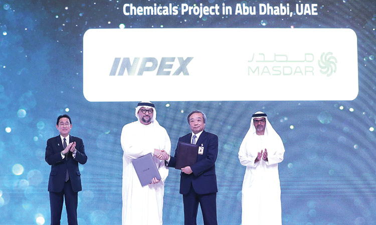 Officials of Masdar and INPEX during the event.
