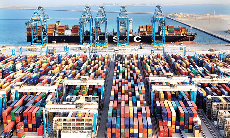A busy Khalifa Port Container Terminal in Abu Dhabi. Expanding foreign trade is a crucial objective of the UAE, in line with its plans to diversify its economy.
