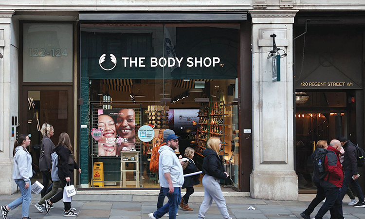Pedestrians pass a branch of The Body Shop in London. The near 50-year-old cosmetics company is near bankrupt in the UK after poor Christmas trade.  Agence France-Presse