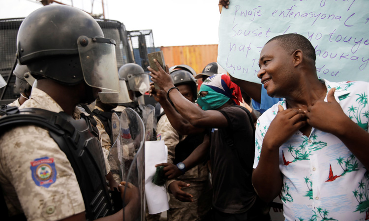 Haiti_Protesters-Gesture-750