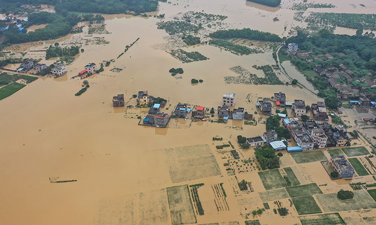 Deadly flooding displaces hundreds of thousands in China ...