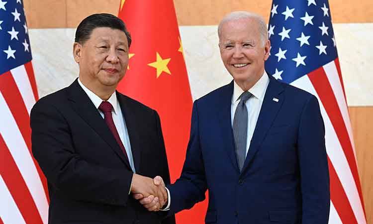 Xi-Biden-hand-shakes-main1-750