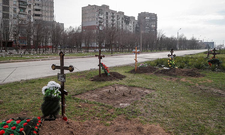 Ukraine-graves-April12-main1-750