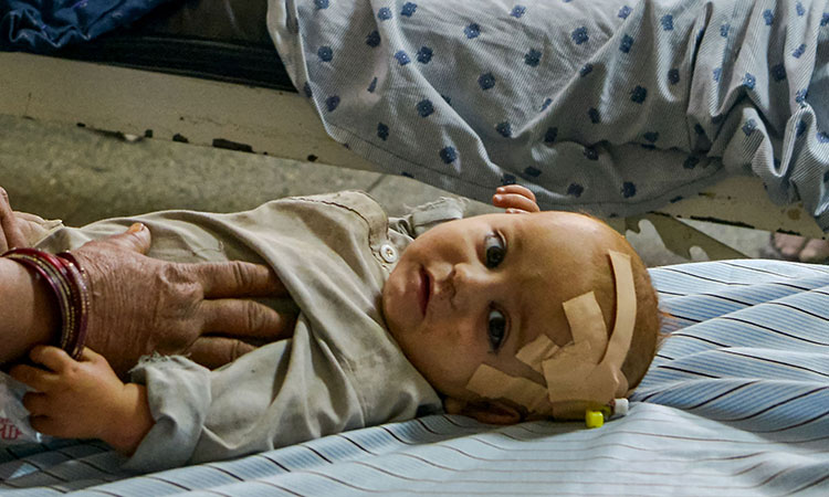 Quake-Afghan-child
