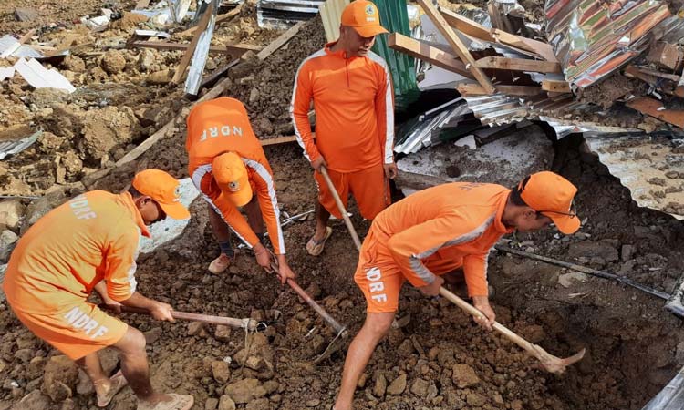 Mudslide leaves 19 dead, 50 missing in northeast India The death toll from a mudslide in northeastern India has risen to 19, with over 50 people missing BC-AS--India-Floods, 1st Ld-Writethru 2022-07-01T08:13:11Z GAUHATI, India (AP) - Rescuers found five more bodies as they resumed clearing operations after an overnight halt looking for dozens of missing people after a mudslide triggered by weeks of heavy downpours killed at least 19 people at a railroad construction site in India's northeast, officials said Friday. Soldiers joined more than 200 disaster response workers and police using earth-clearing equipment like bulldozers to rescue those buried under the debris in Noney, a town near Imphal, the capital of Manipur state. But the terrain is making it difficult to move heavy equipment, said H. Guite, district magistrate, adding that he has asked for reinforcements. Intermittent rain continues in the region where 19 bodies have been recovered so far after a hillock caved in and buried the railroad project area, Guite told The Associated Press. Lt. Gen. R.P. Kalita, head of the army's eastern command, visited the site. He said 13 army soldiers and five civilians have been rescued from the debris of the entirely swept away railroad station, staff residential quarters and other infrastructure that was being built in the area. The army also has set up a medical post at the site to help those found alive, Kalita said. Eighteen people with injuries have been hospitalized, said Guite. He put the number of people still unaccounted for at around 50. A flowing river has been blocked by the debris, creating a dam-like structure in the area, he said. People living nearby have been asked to move to safe areas, media reports said. Ten of the confirmed dead were members of the Territorial Army. Because of a decades-old insurgency seeking a separate homeland for ethnic and tribal groups in the area, army personnel were there providing security for the railway officials. Most of those carried off in the mudslide were sleeping when it hit the area early Thursday. Some survivors recalled being swept down by the gush of the hill debris, The Times of India daily cited Daichuipao, a resident, as saying. Prime Minister Narendra Modi said he reviewed the situation with local authorities. "Assured all possible support from the Centre (federal government)," he tweeted. Continuous rainfall over the past three weeks has wreaked havoc across India's northeast - which has eight states and 45 million people - and in neighboring Bangladesh. An estimated 200 people have been killed in heavy downpours and mudslides in states including Assam, Manipur, Tripura and Sikkim, while 42 people have died in Bangladesh since May 17. Hundreds of thousands of people have been displaced. Scientists say climate change is a factor behind the erratic, early rains that triggered the unprecedented floods. Monsoon rains in South Asia typically begin in June, but torrential rain lashed northeastern India and Bangladesh as early as March this year. With rising global temperatures due to climate change, experts say the monsoon season is becoming more variable, meaning that much of the rain that would typically fall throughout the season arrives in a shorter period.