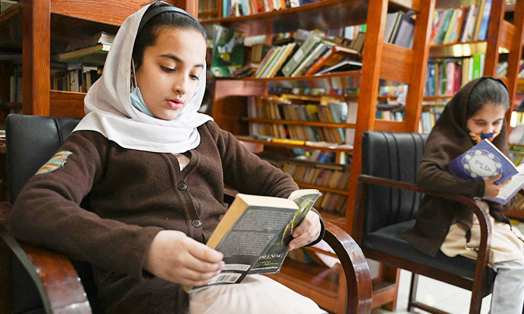Reading-book-Pakistanigrils