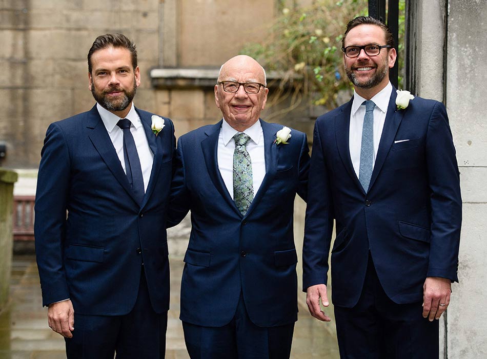 Rupert Murdoch (centre) flanked by his sons Lachlan (left) and James arrive in central London. File / AFP