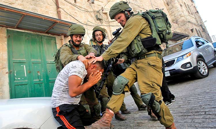 Israeli soldiers torture Palestinian