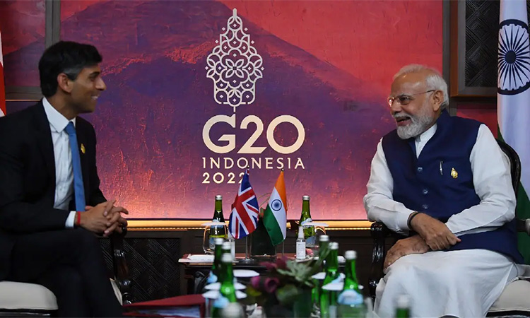 Britain's Prime Minister Rishi Sunak and Indian Prime Minister Narendra Modi hold a meeting in Nusa Dua, Indonesia.