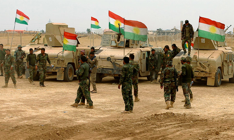 Kurdish Peshmerga military vehicles are seen at Jarbuah village near Bashiqa near Mosul, Iraq. Reuters