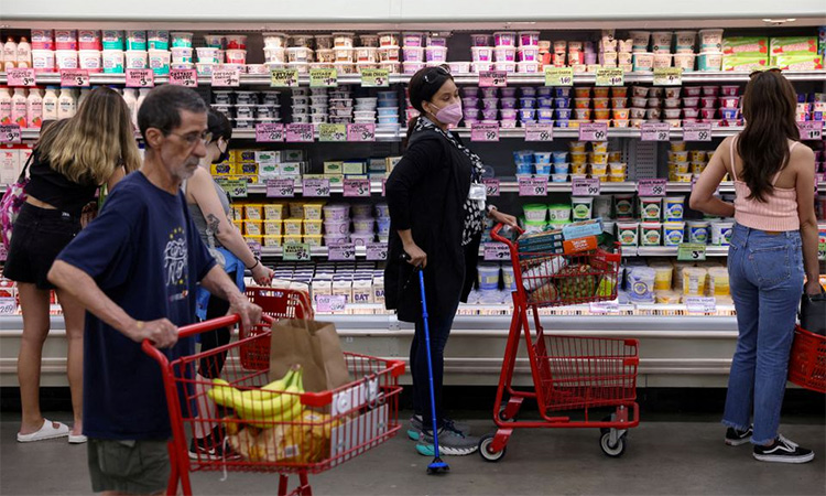  People shop in a supermarket as inflation affected consumer prices in Manhattan, New York City. Reuters