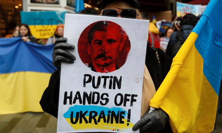Ukrainians living in Turkey hold a protest against Russia's massive military operation in Ukraine, in front of the Russian Consulate. Reuters