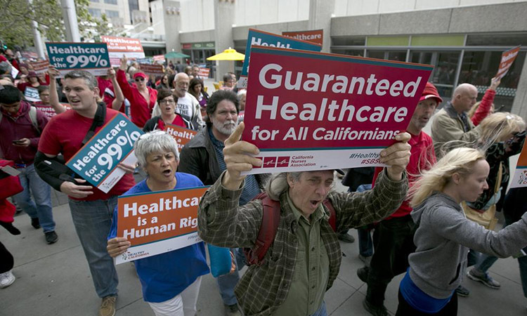 Supporters of single-payer health care march to the Capitol in Sacramento, California. File/AP