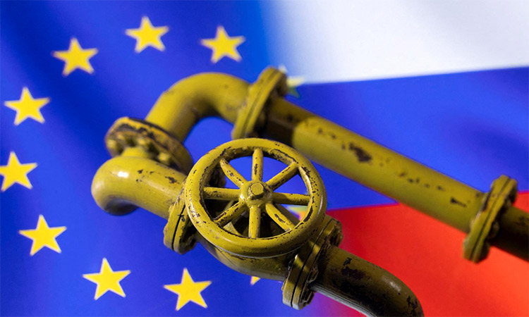 3D printed natural gas pipes are pictured on EU and Russian flags in this illustration. Reuters