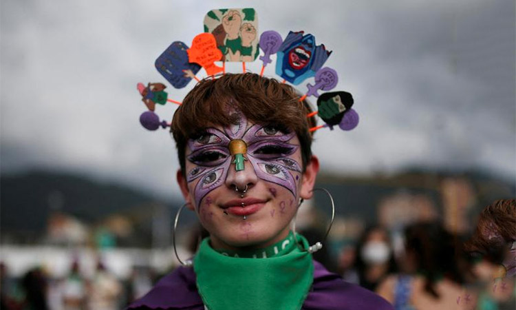 A woman participates in a rally during International Women's Day celebrations in Bogota, Colombia. Reuters