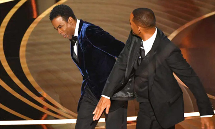 Will Smith slaps Chris Rock during the Academy Awards ceremony. Reuters