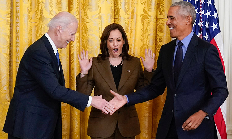 President Joe Biden shakes hands with former President Barack Obama at the White House in Washington. AP