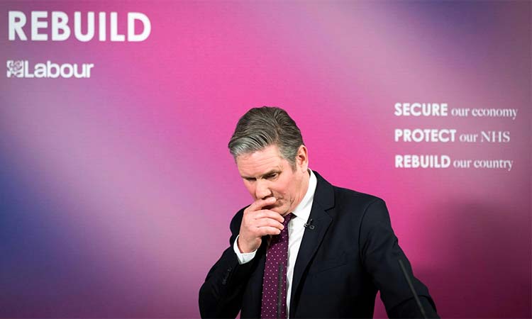 Keir Starmer pauses as he delivers a virtual speech on Britain's economic future in London. File/Reuters