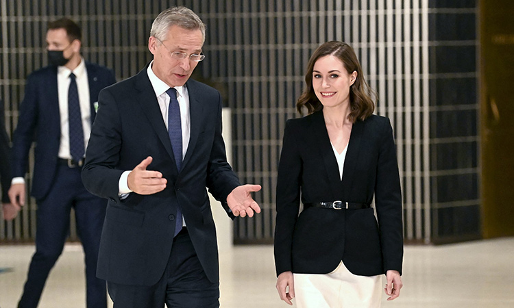 NATO Secretary General Jens Stoltenberg (left) with Finland’s Prime Minister Sanna Marin during the North Atlantic Council’s visit in Helsinki, on Oct.25, 2021.  File/Agence France-Presse