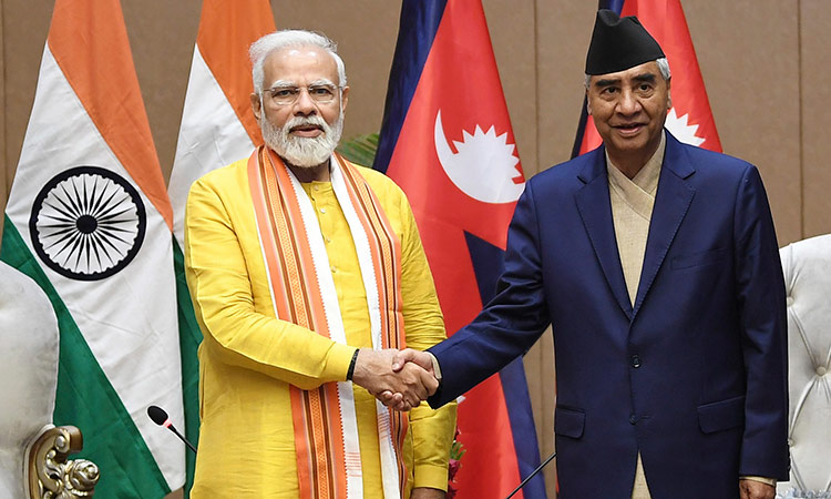 Indian Prime Minister Narendra Modi (left) and his Nepalese counterpart Sher Bahadur Deuba, during their bilateral meeting in Lumbini, Nepal. AP