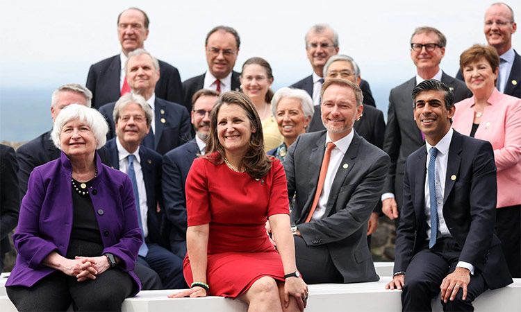 U.S. Treasury Secretary Janet Yellen, Canada’s Finance Minister Chrystia Freeland, Germany’s Finance Minister Christian Lindner, British Chancellor of the Exchequer Rishi Sunak and other attendees pose for a family photo during the G7 Summitin Koenigswinter, near Bonn, Germany. Reuters